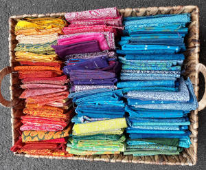 Basket tray of 140+ fat quarters of over-dyed fabrics